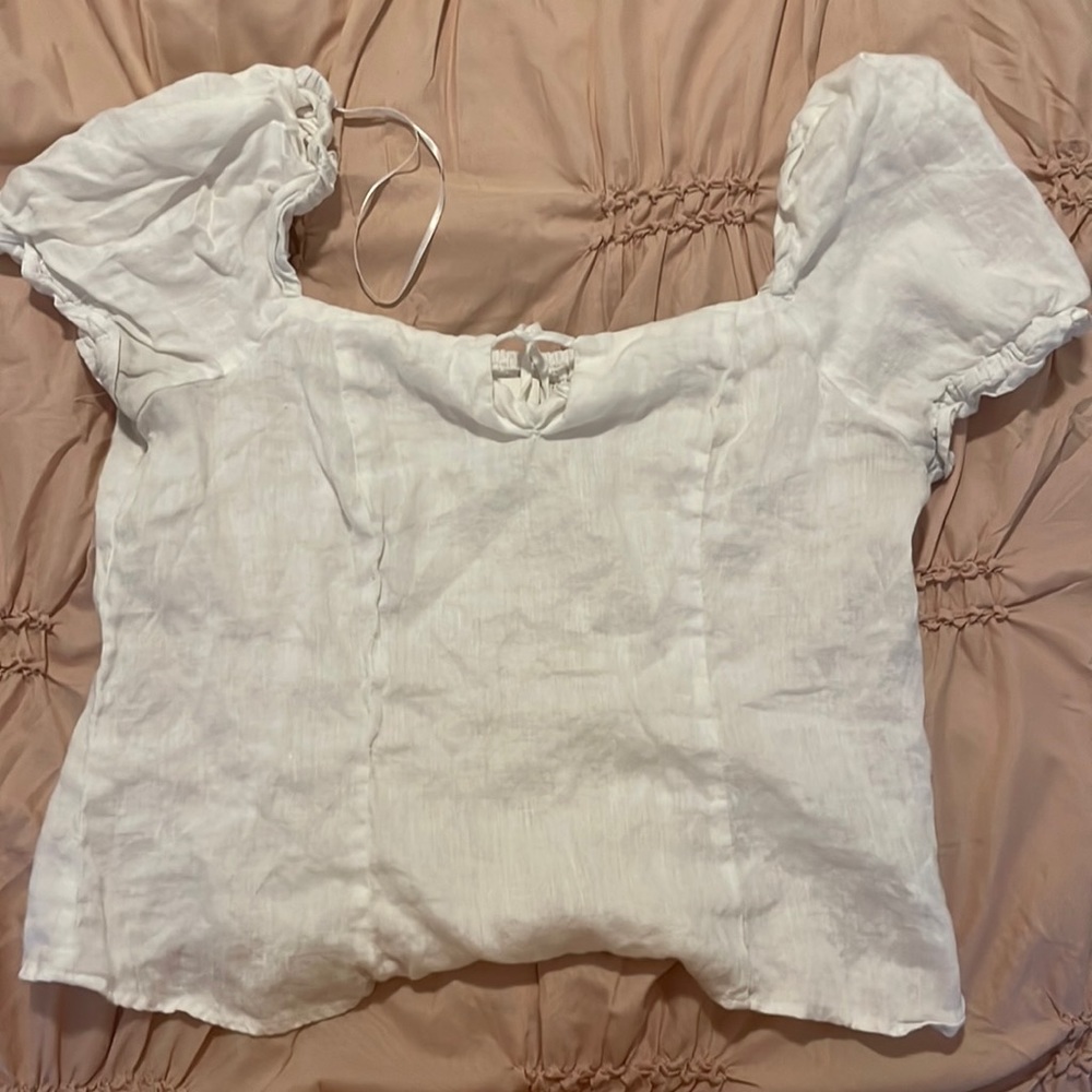 Large Shirt From H and M. White color shortsleeved With Puffed/Regian sleeves